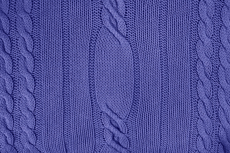 近距离的紫红色淡色图案毛衣图片下载